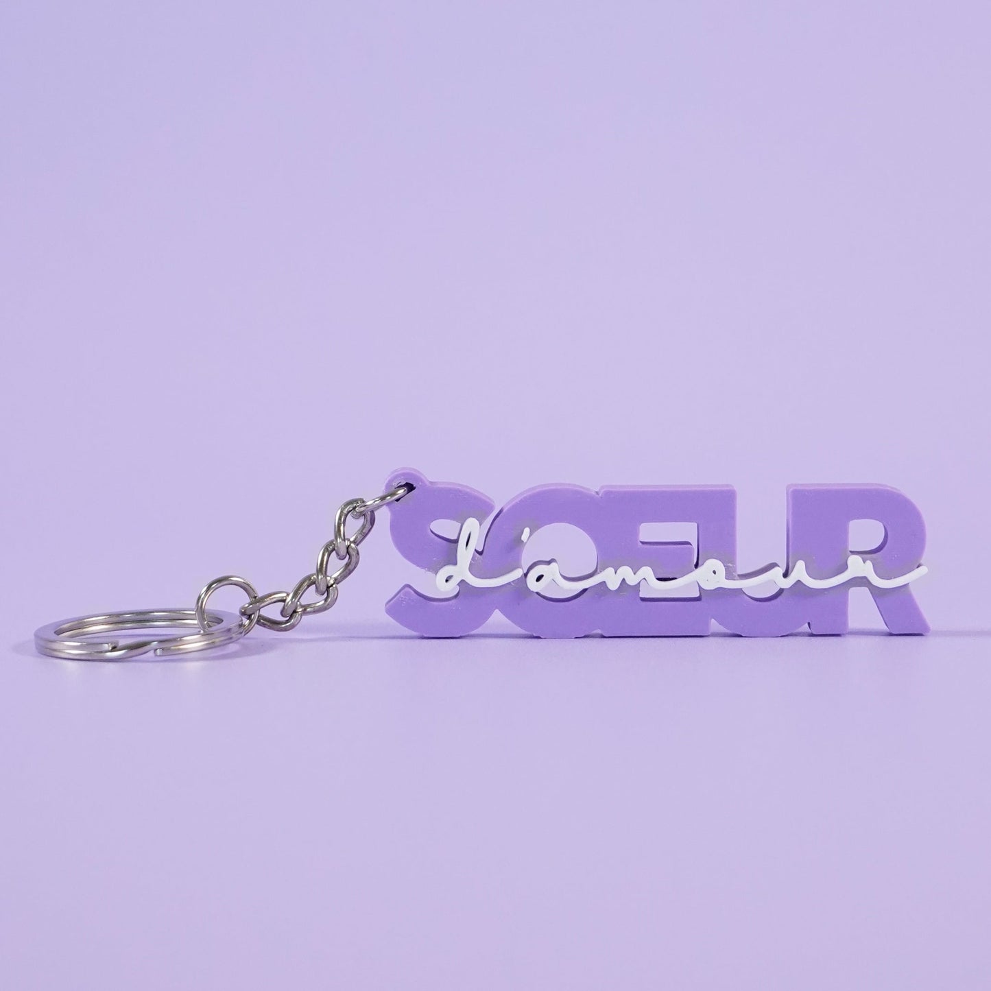 Porte-clé soeur d'amour ultra violet